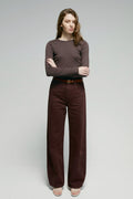 High-rise relaxed wide-leg jeans in mid-weight non-stretch cotton denim, front view showing button closure and full-length leg
