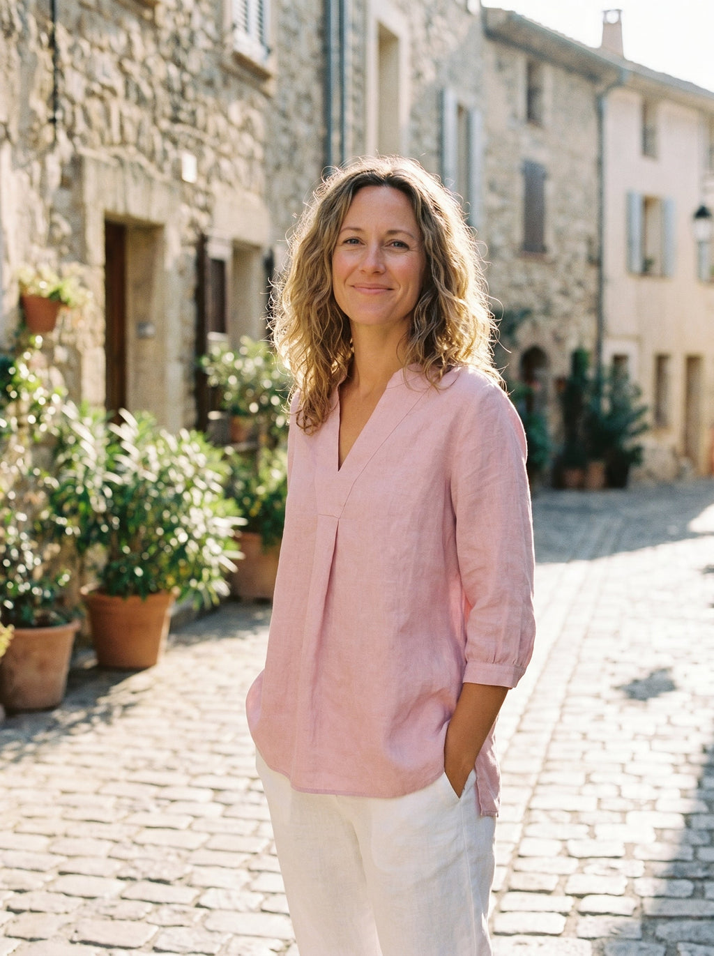 Relaxed-fit 100% linen shirt dress with stand-up collar and side vents in a soft natural tone