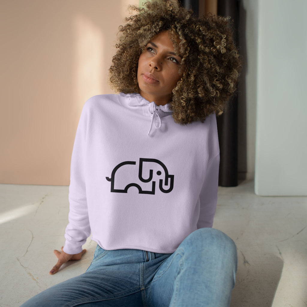 Women's pale pink cropped hoodie with minimalist single-line elephant graphic on chest, shown from front on female model