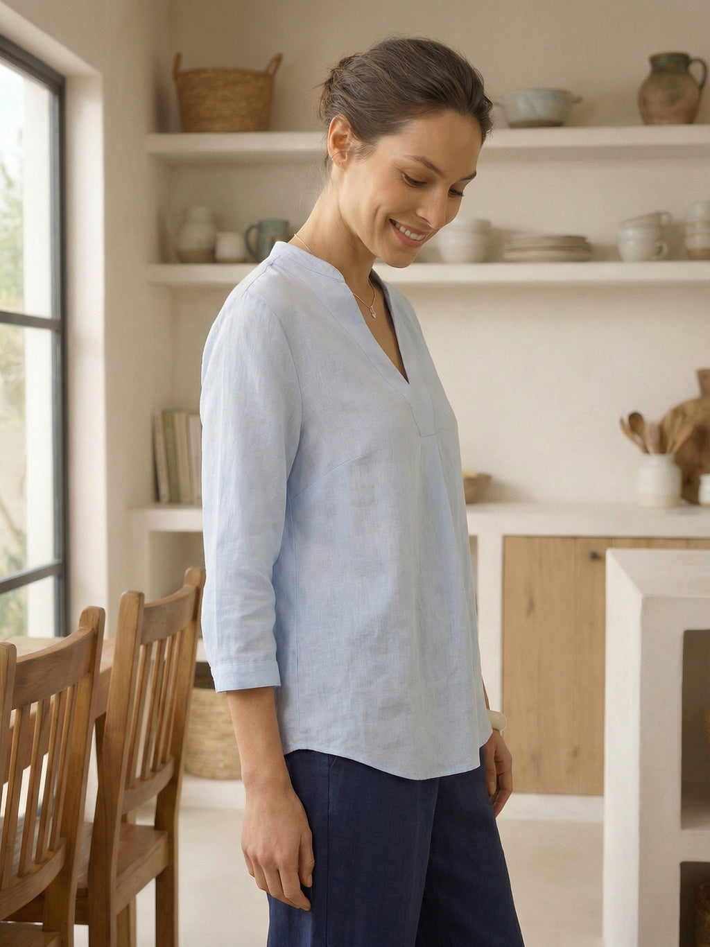 Relaxed-fit 100% linen shirt dress with stand-up collar and side vents in a soft natural tone
