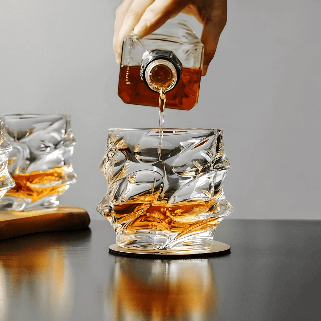 Handcrafted Storm Crystal Whisky Glass with textured exterior and smooth interior, filled with amber whisky