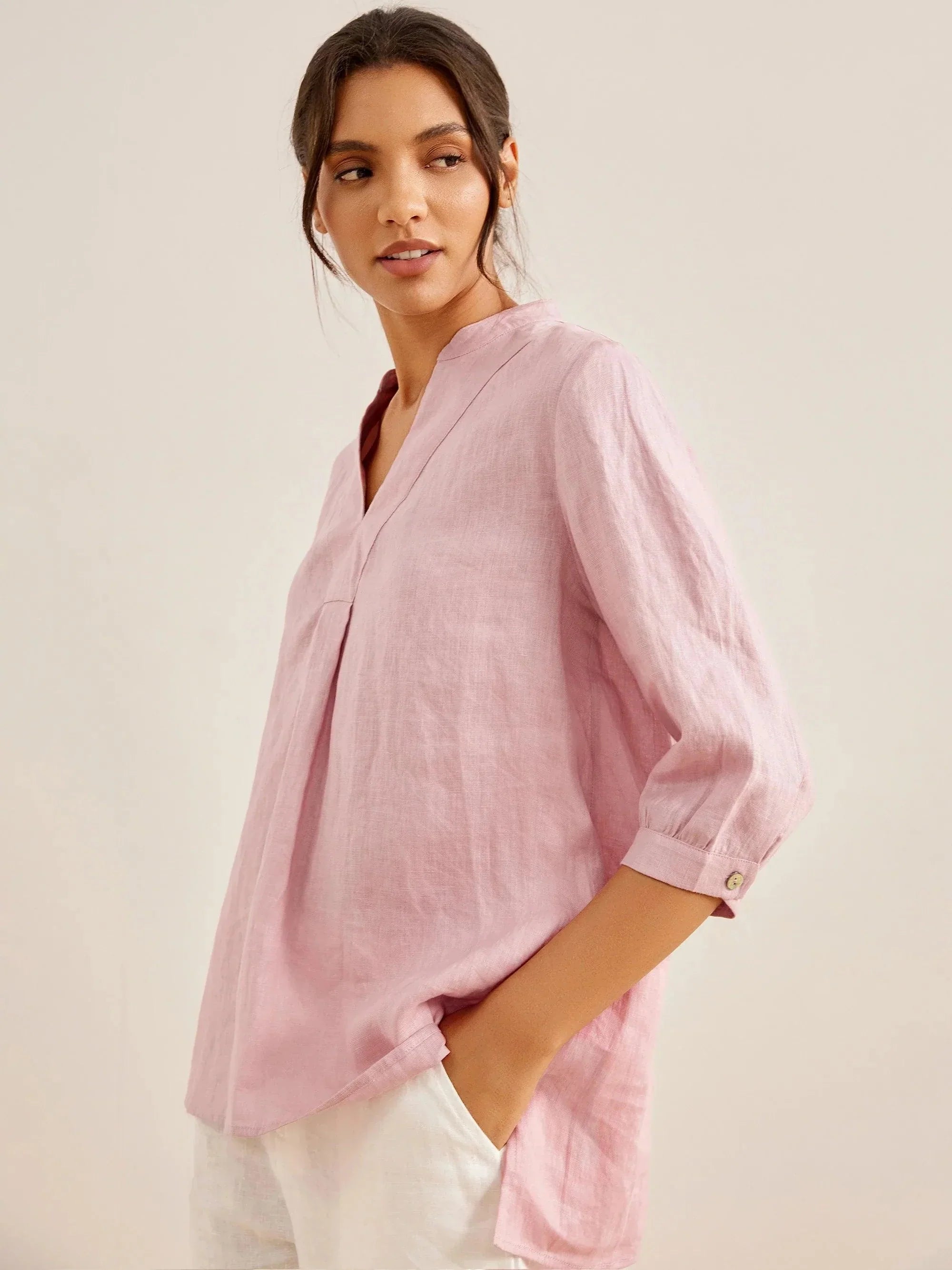 Relaxed-fit 100% linen shirt dress with stand-up collar and side vents in a soft natural tone
