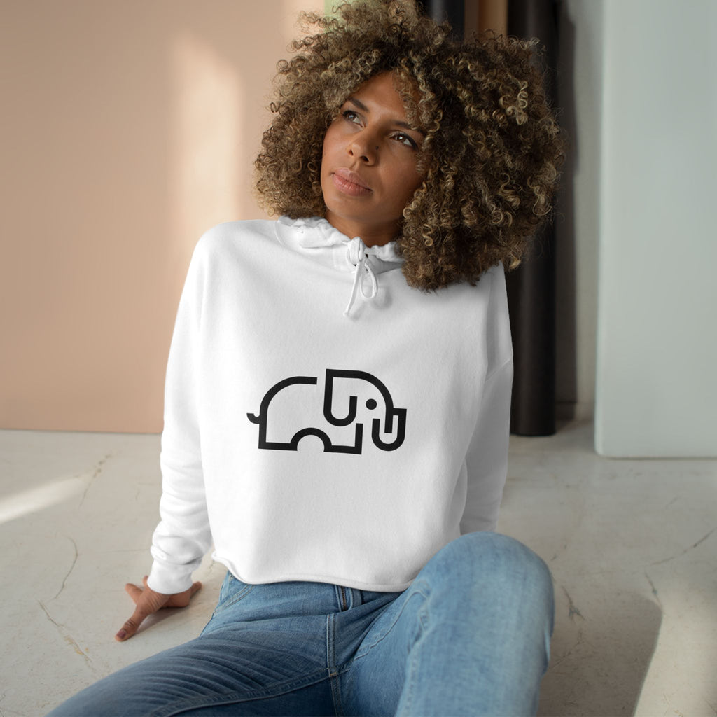 Women's pale pink cropped hoodie with minimalist single-line elephant graphic on chest, shown from front on female model