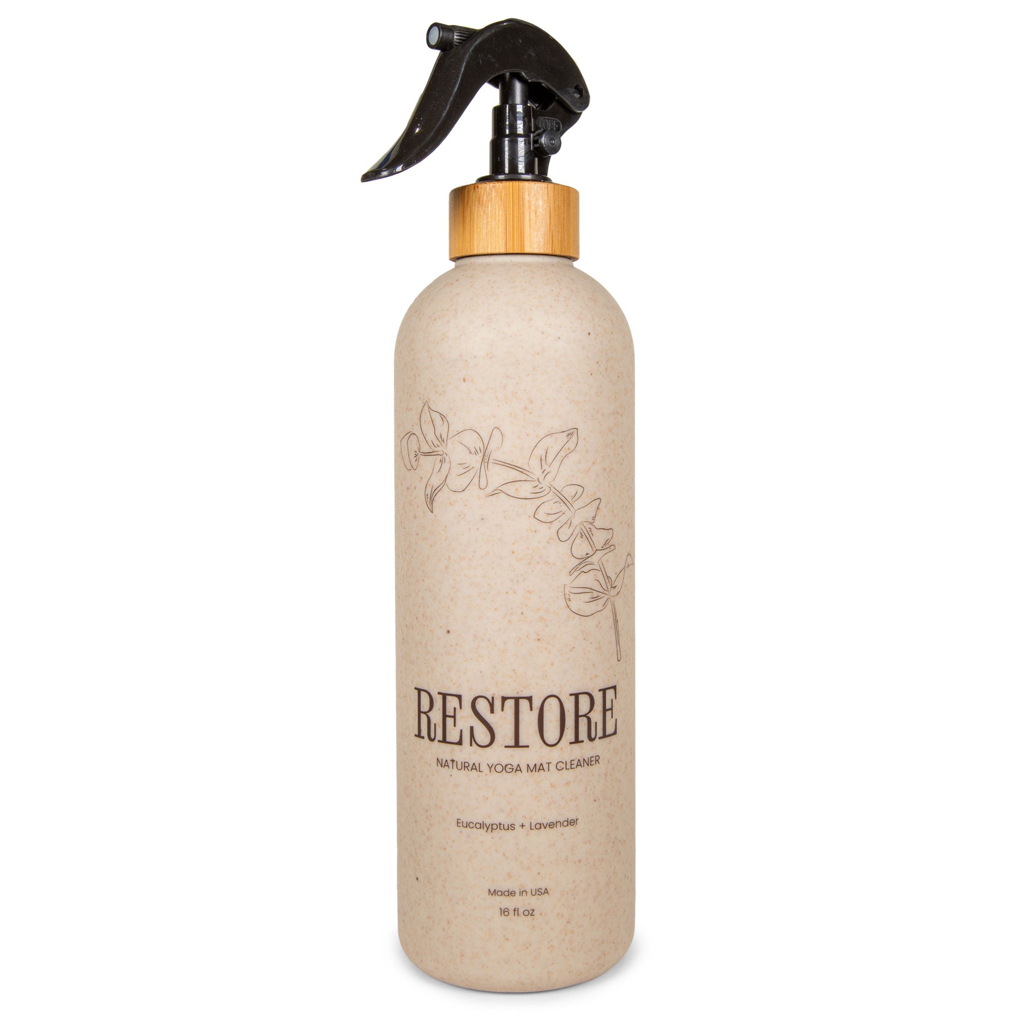 16oz wheat straw bottle of organic cork yoga mat cleaner spray on a cork yoga mat