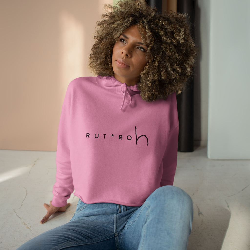 White cropped hoodie with minimal hand-drawn RUT*ROh chest graphic, dropped shoulders and raw hem, casual streetwear style