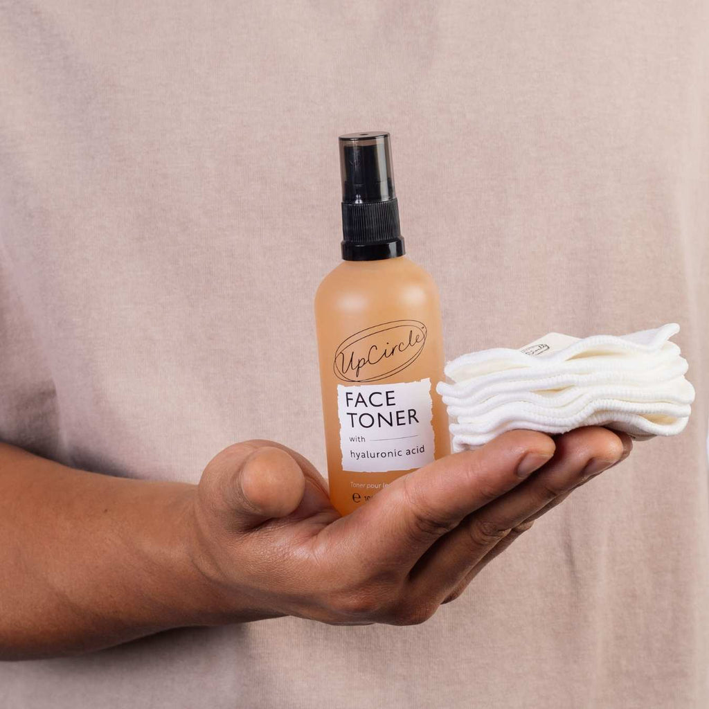 UpCircle Hyaluronic Acid and Chamomile Face Toner in a glass spray bottle with cardboard packaging on a clean surface