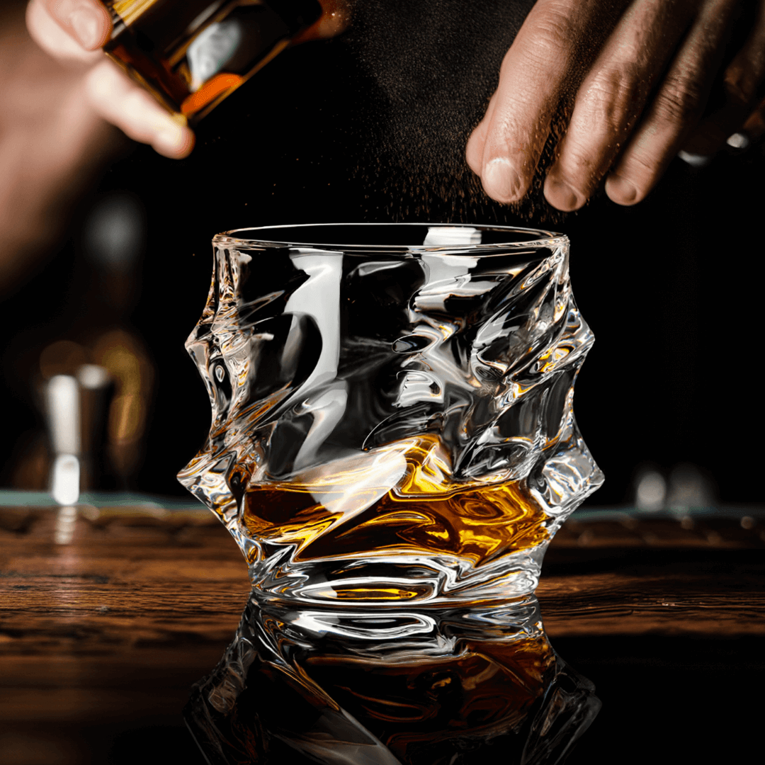 Handcrafted Storm Crystal Whisky Glass with textured exterior and smooth interior, filled with amber whisky