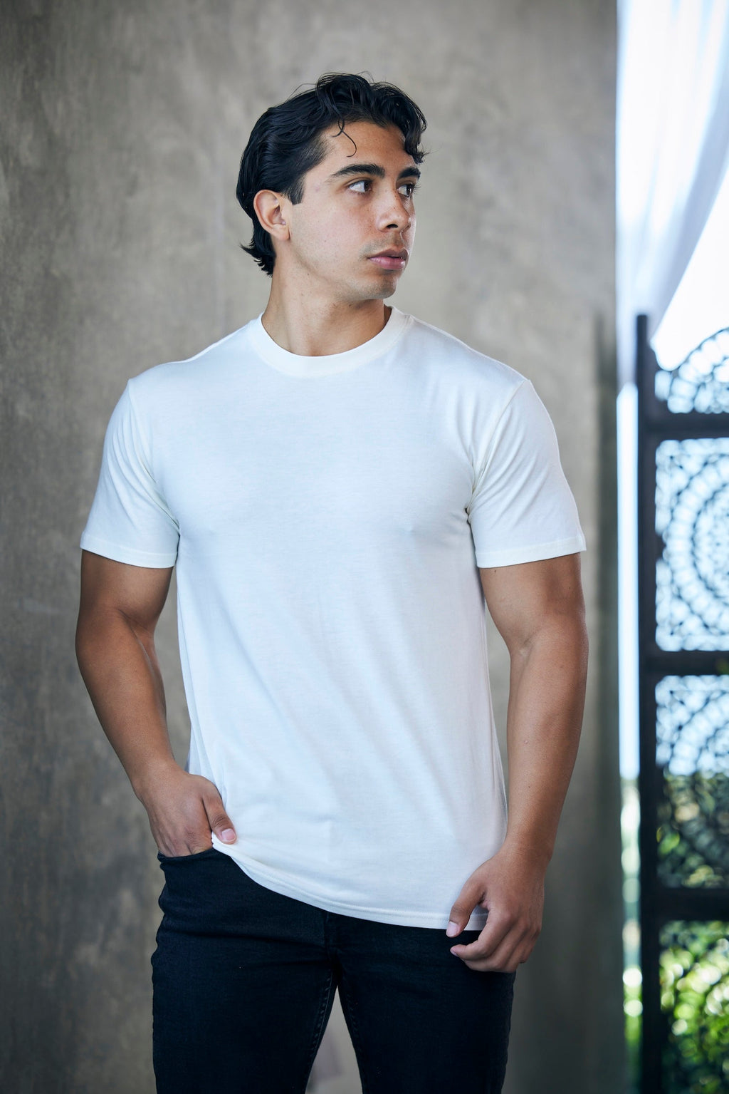 Men's bamboo viscose organic cotton crew neck t-shirt in charcoal grey, classic straight cut, laid flat on neutral background