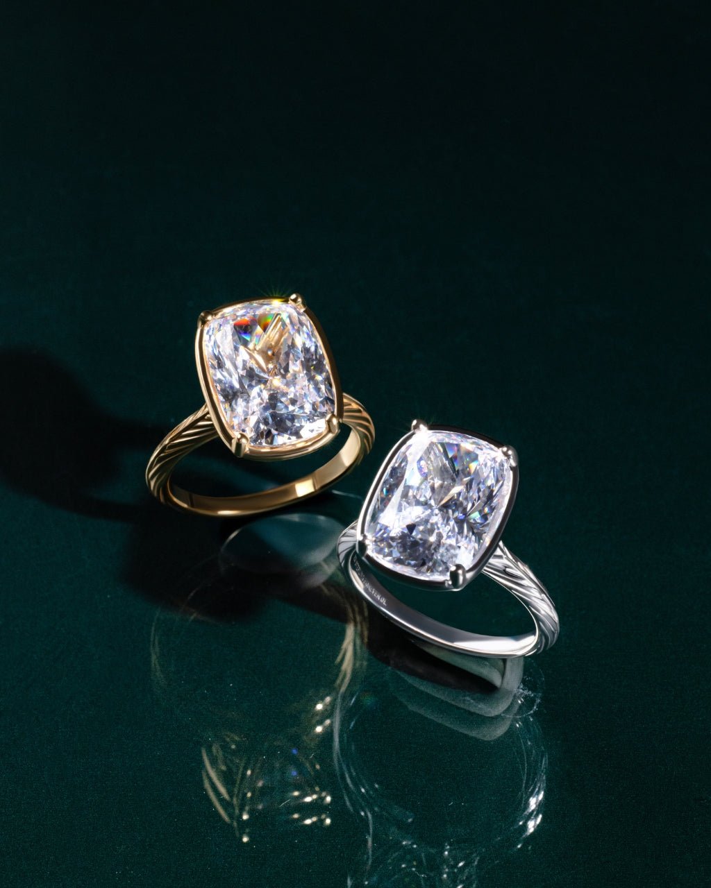 Elongated cushion-cut cubic zirconia cocktail ring in gold-plated sterling silver on a hand, showing large faceted stone and slim band