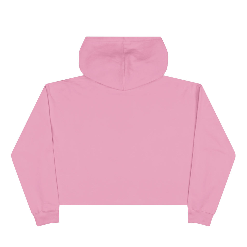 Women's pale pink cropped hoodie with minimalist single-line elephant graphic on chest, shown from front on female model