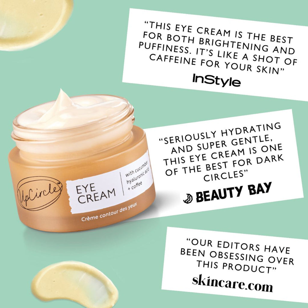 UpCircle eye cream in a glass jar with aluminium lid, showing coffee oil and hyaluronic acid formula for dark circles