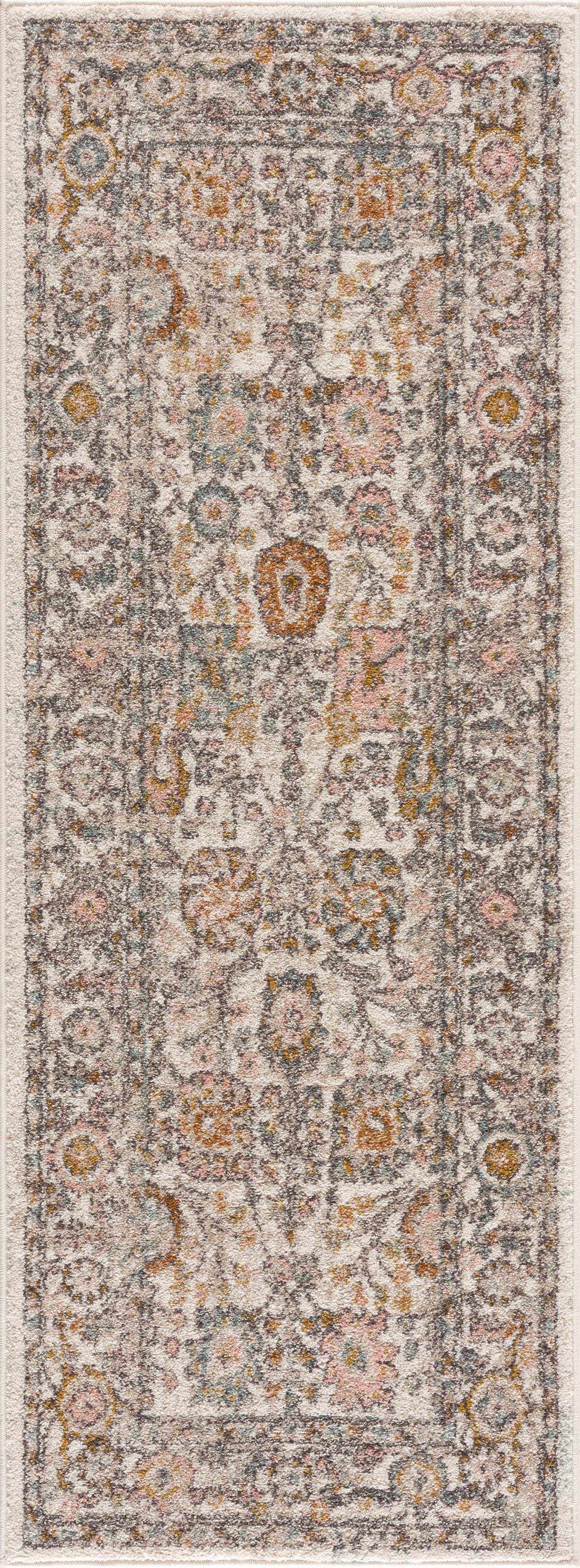 Herstmonceux traditional area rug with vintage pattern in charcoal, mustard, dusty pink, and off-white tones on a medium pile