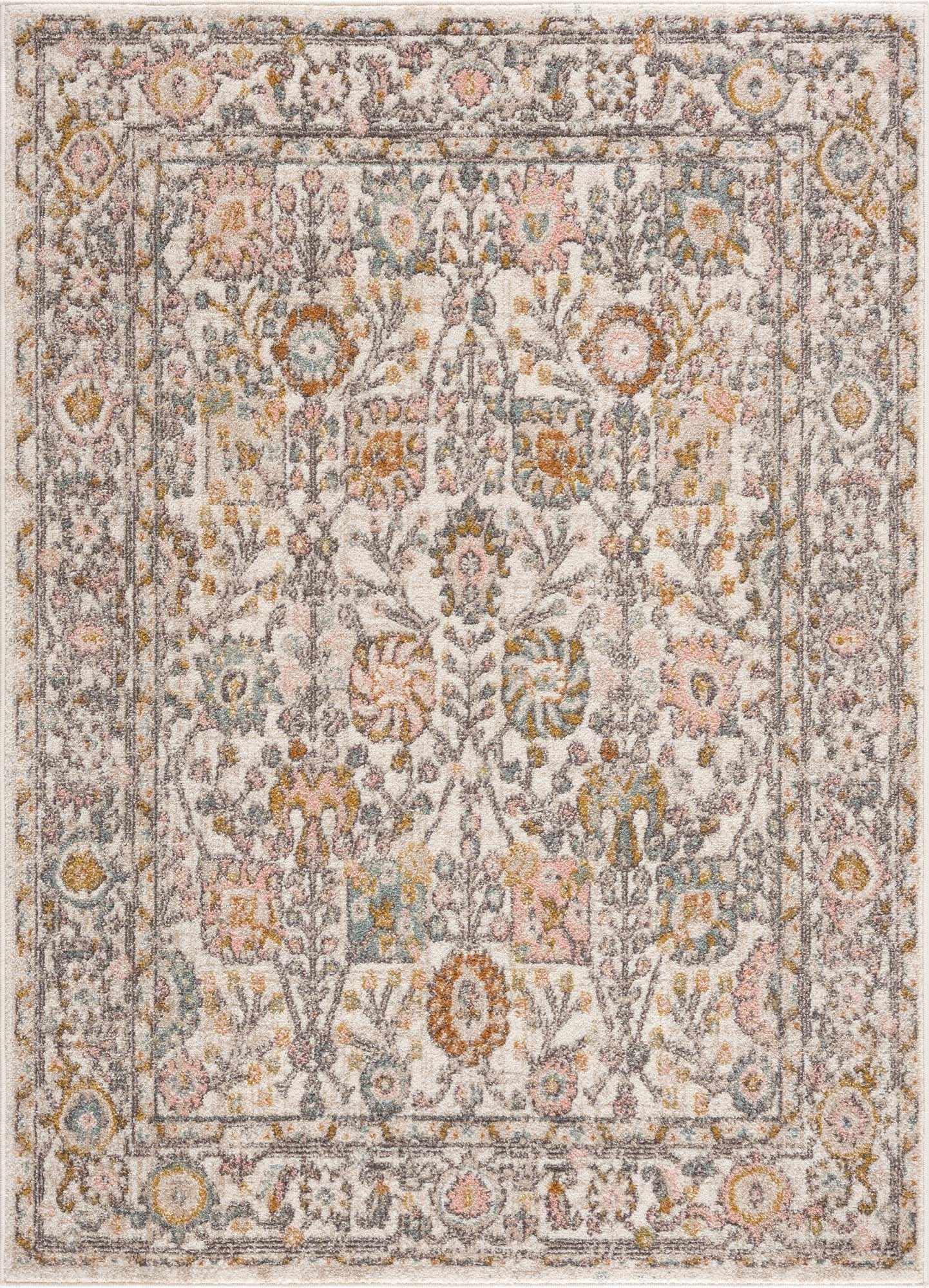 Herstmonceux traditional area rug with vintage pattern in charcoal, mustard, dusty pink, and off-white tones on a medium pile