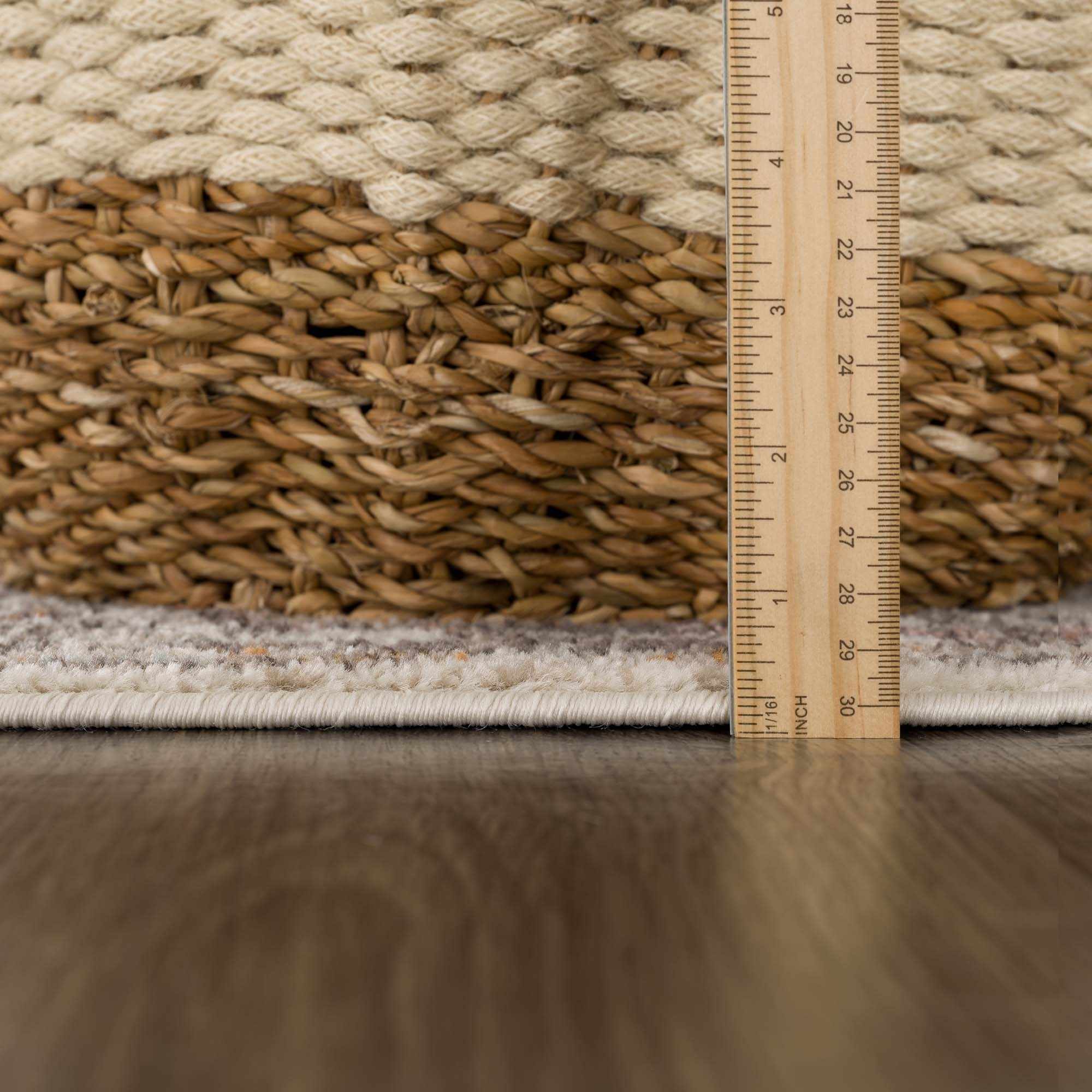 Herstmonceux traditional area rug with vintage pattern in charcoal, mustard, dusty pink, and off-white tones on a medium pile