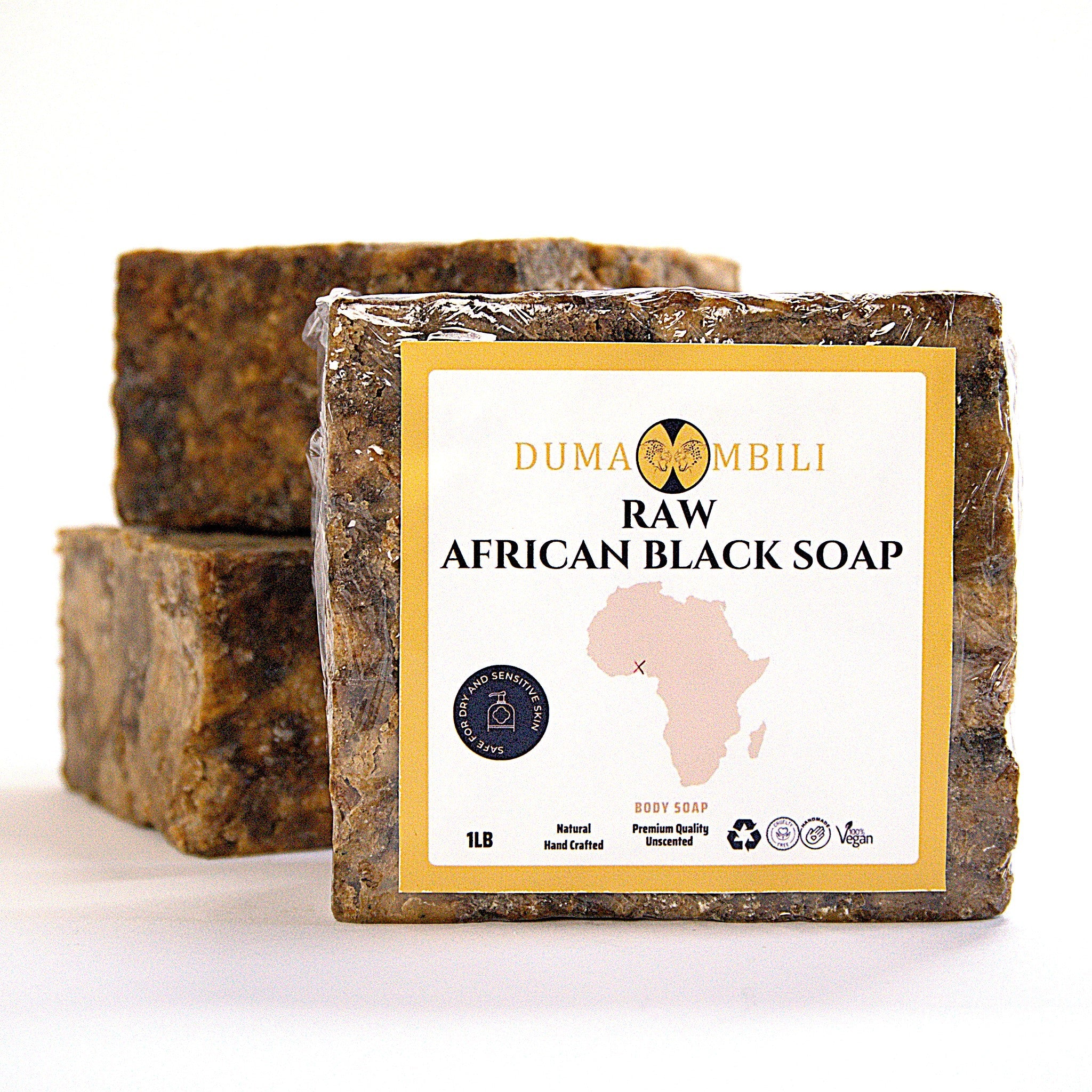 Handcrafted Ghanaian African black soap bar with natural matte texture, shown on a clean surface