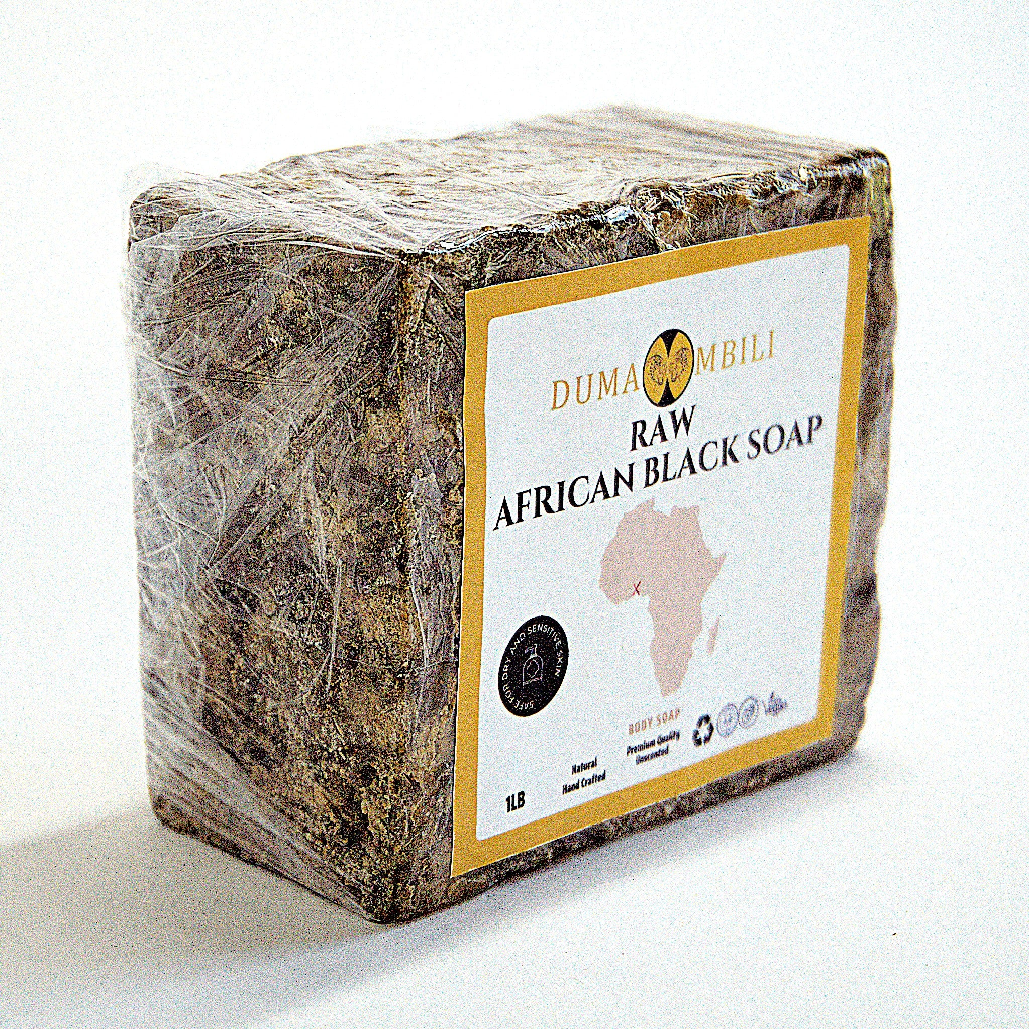 Handcrafted Ghanaian African black soap bar with natural matte texture, shown on a clean surface