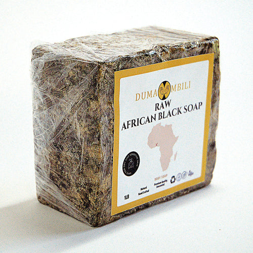Handcrafted Ghanaian African black soap bar with natural matte texture, shown on a clean surface