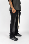 KTL Studios sun-dried bleached heavyweight cotton sweatpants with elastic waistband and outer drawstring, worn by male model