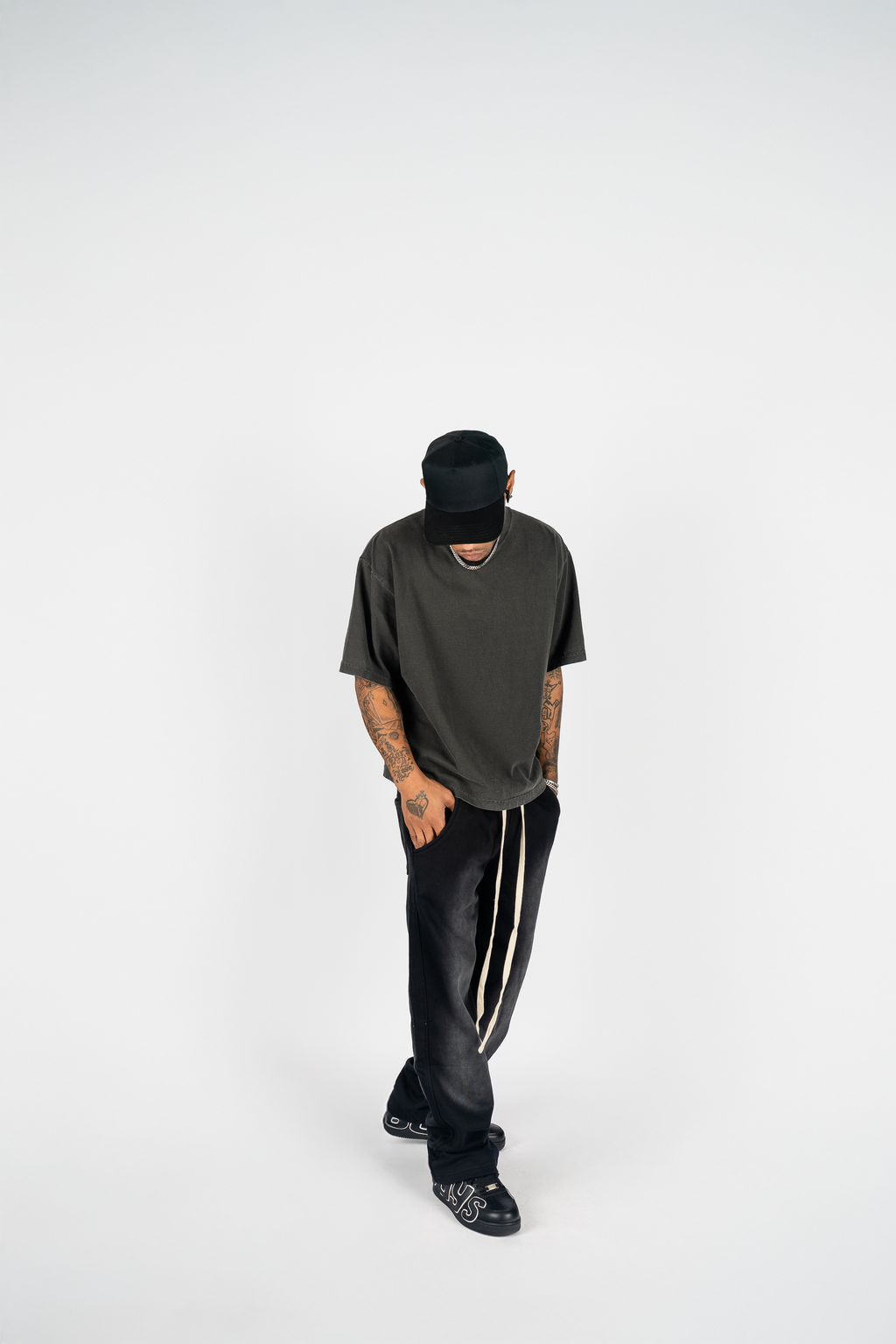 KTL Studios sun-dried bleached heavyweight cotton sweatpants with elastic waistband and outer drawstring, worn by male model
