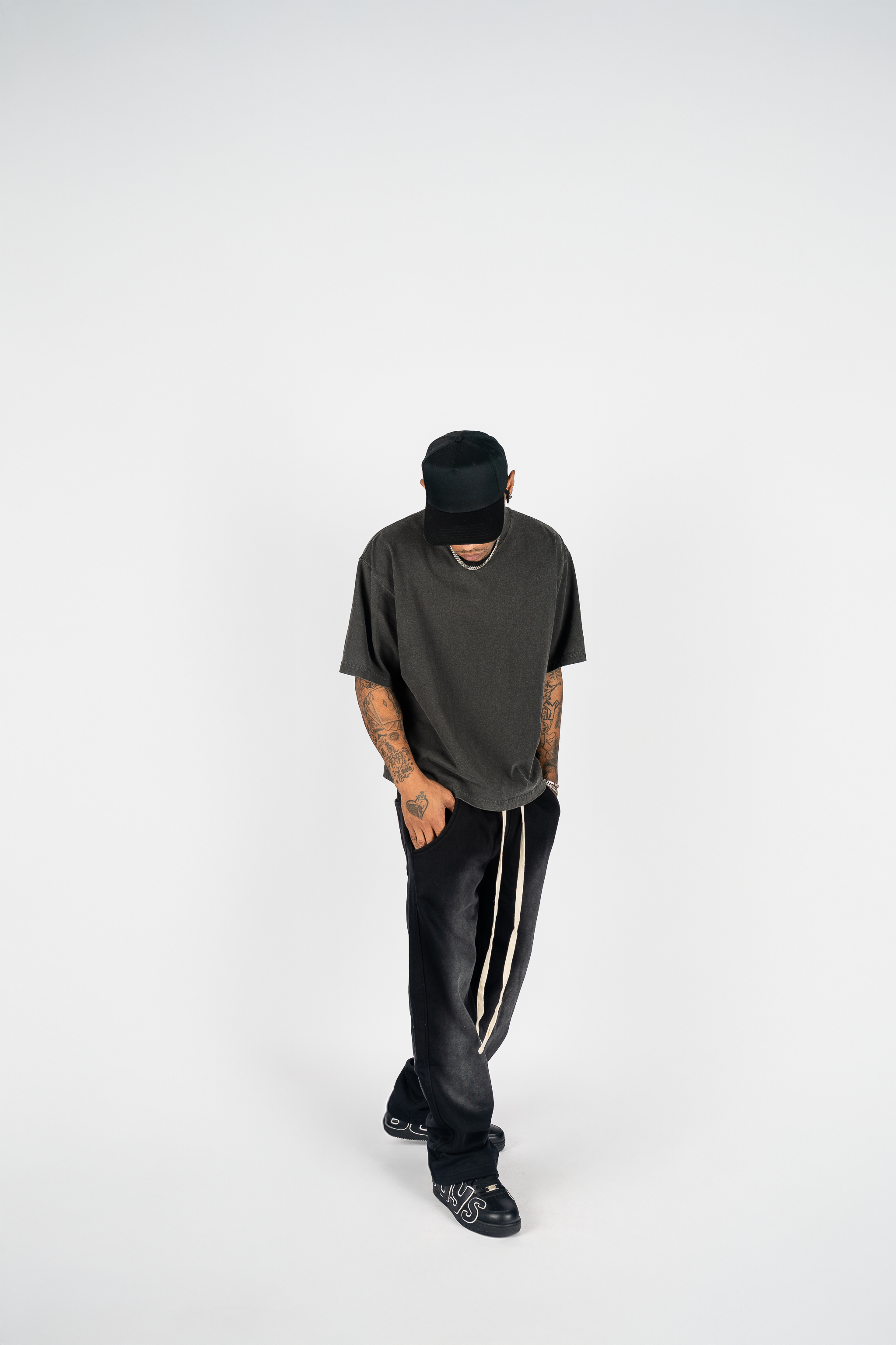 KTL Studios sun-dried bleached heavyweight cotton sweatpants with elastic waistband and outer drawstring, worn by male model