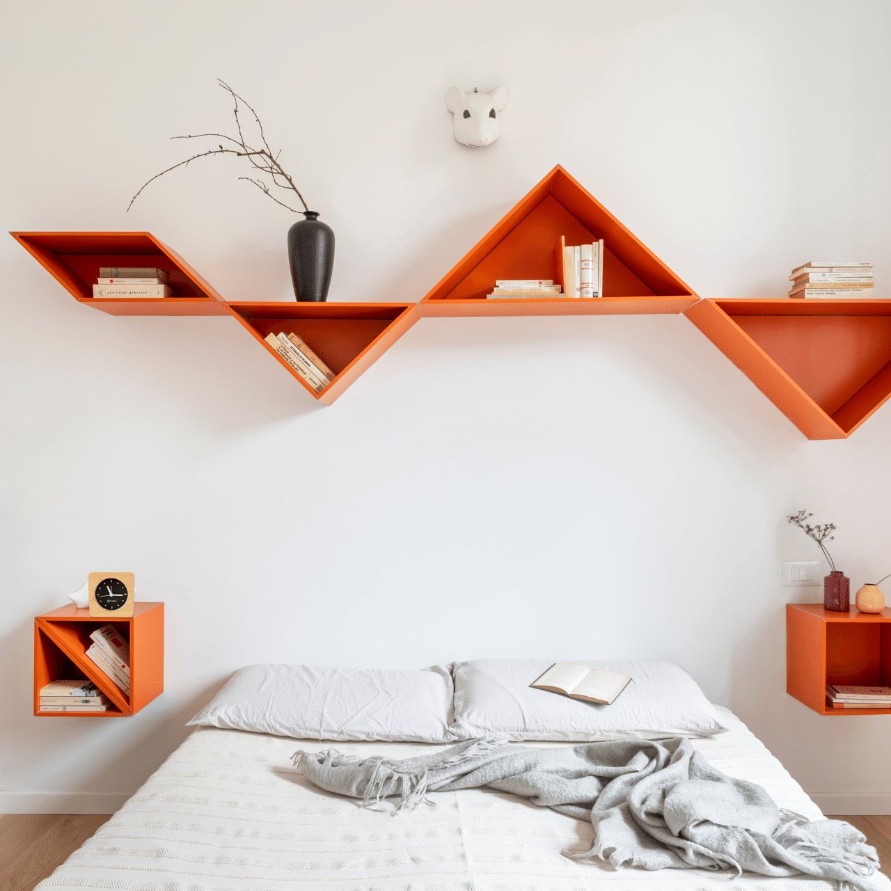 Bagby Minimalist analog alarm clock with solid wood frame and number-free dial on a nightstand