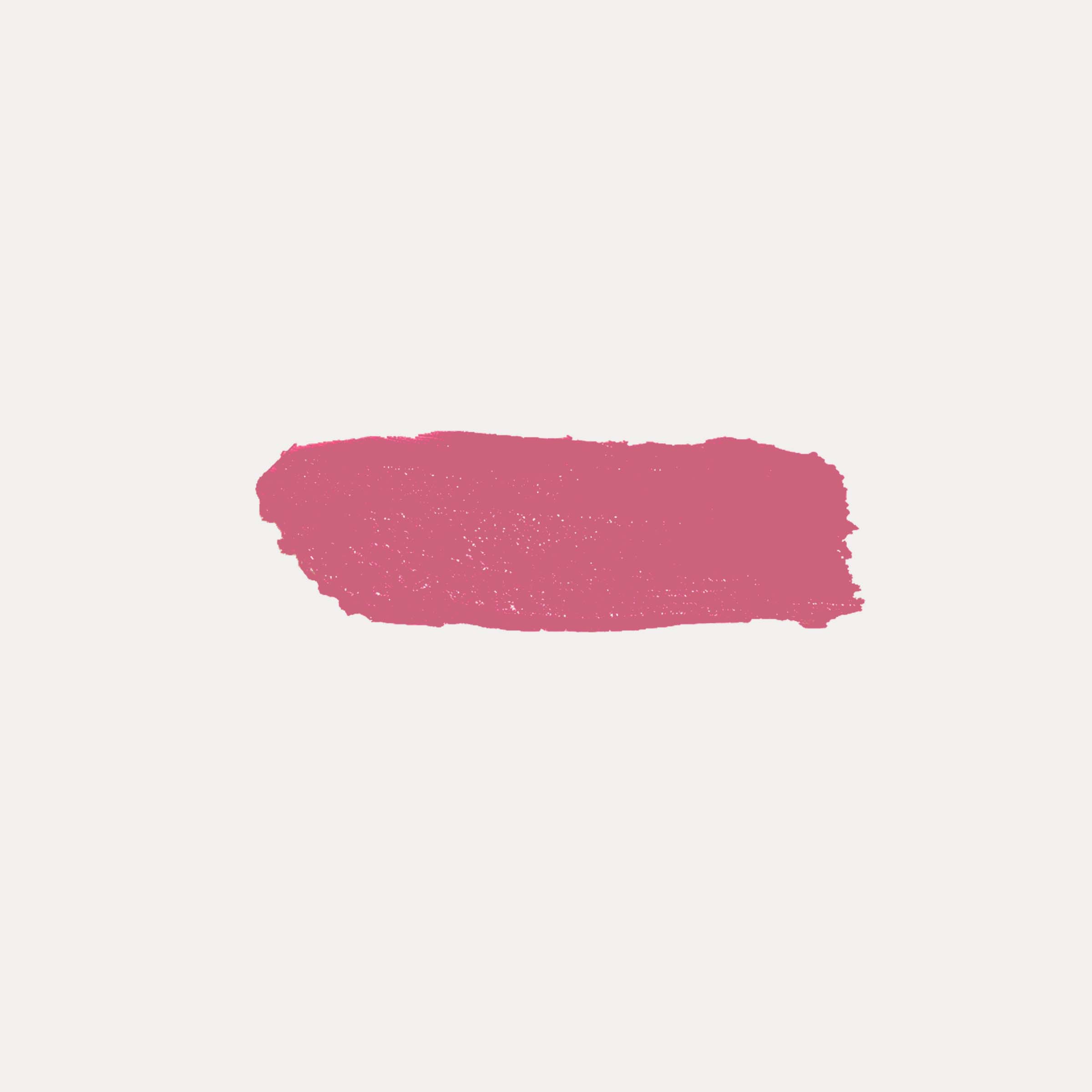 Close-up of buildable cream blush compact with a soft rosy swatch on fair skin showing a dewy, natural flush
