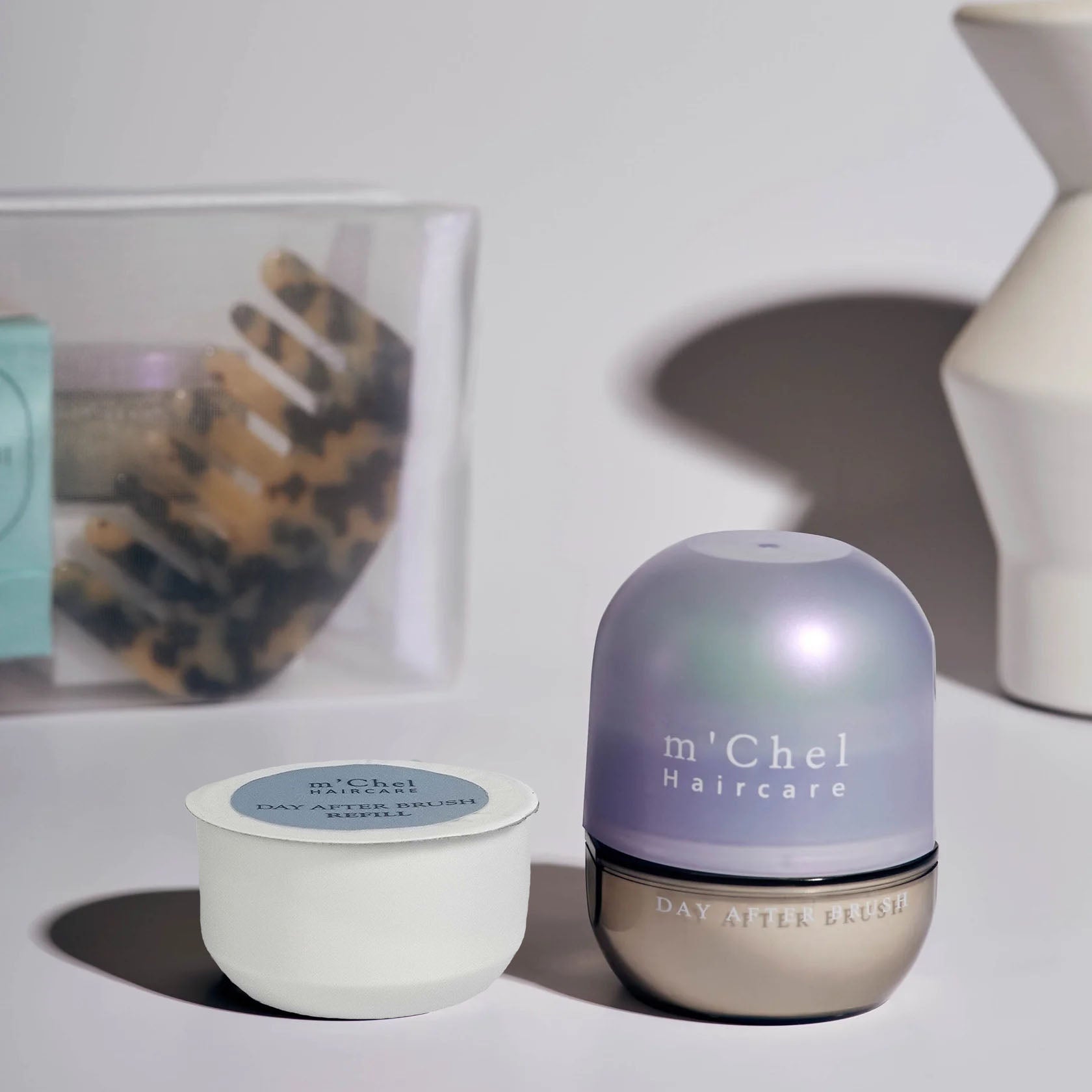 Day After dry shampoo brush refill powder canister in neutral packaging against a clean white background