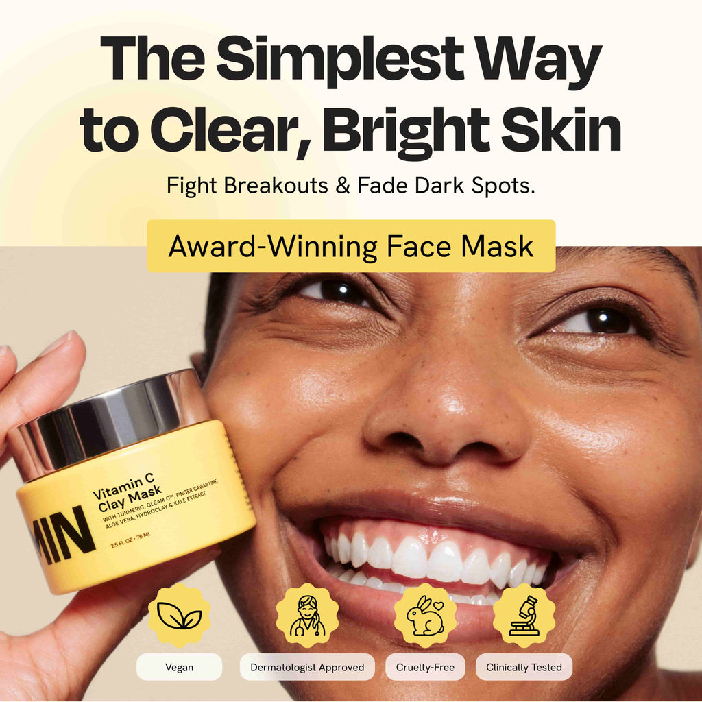 Vitamin C clay mask in jar with turmeric-toned formula, shown with Australian botanical ingredients on a clean white surface