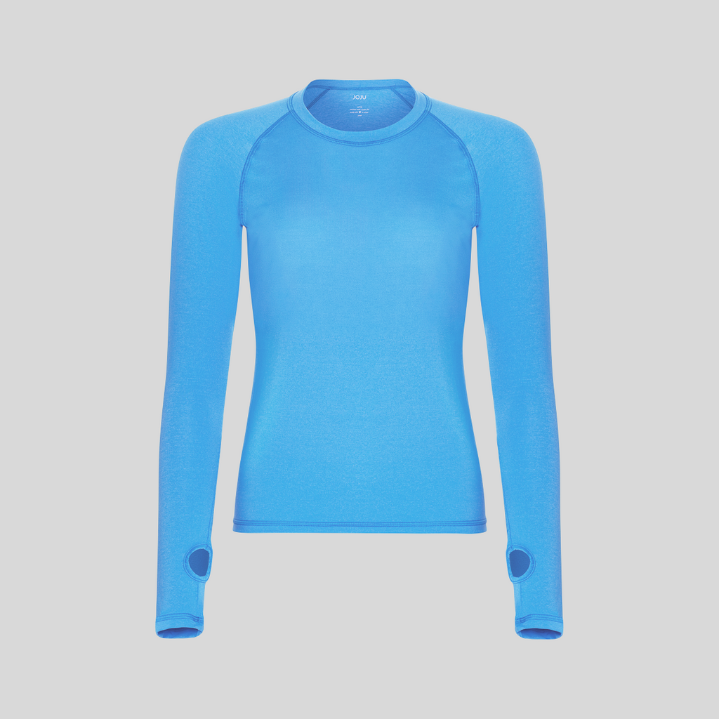 Women's long-sleeve UPF 50+ sun shirt in lightweight Italian fabric with thumbholes, shown from front