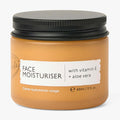 UpCircle Vitamin E Face Moisturizer in a glass jar with aluminum lid on a clean neutral background