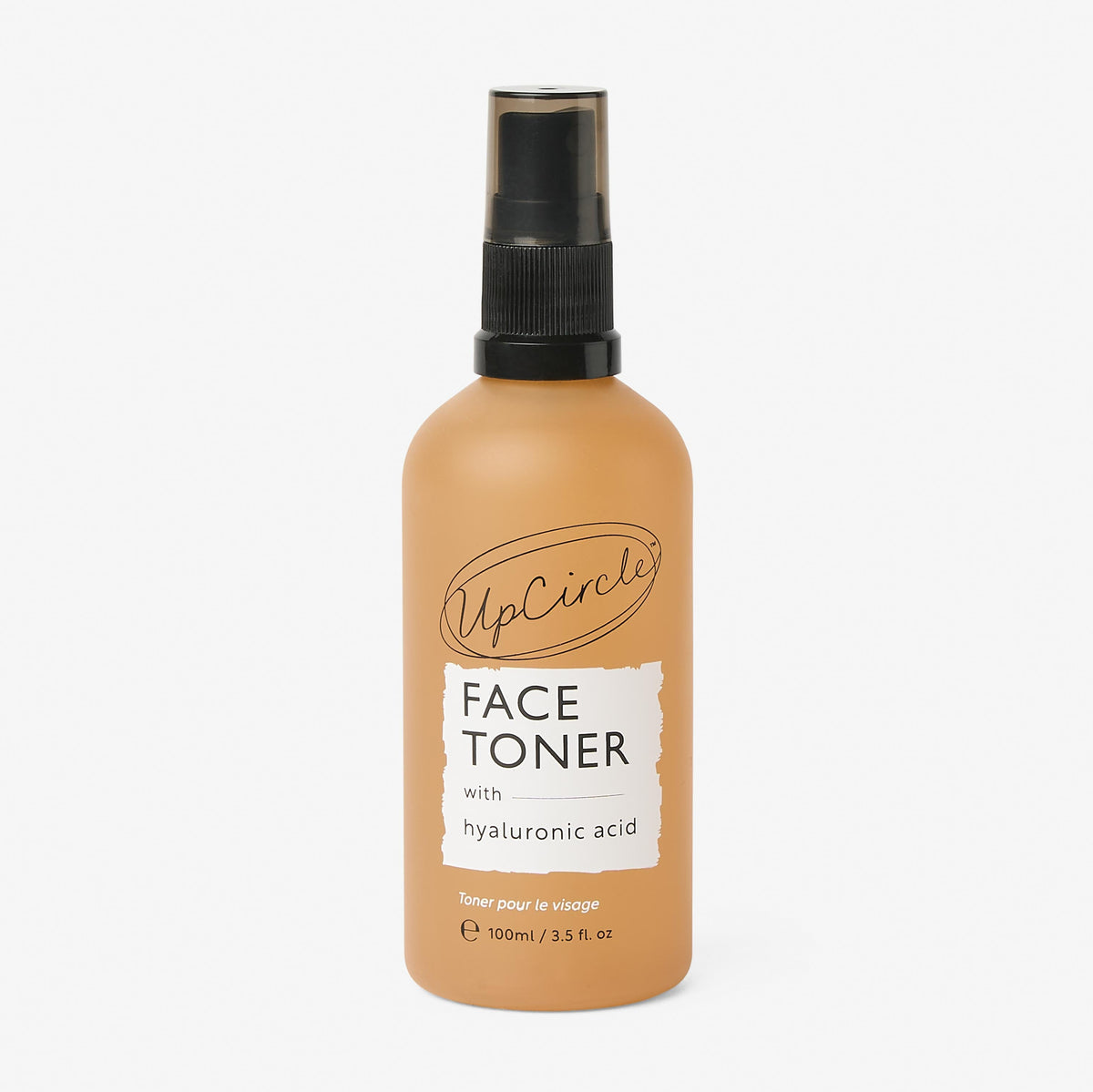 UpCircle Hyaluronic Acid and Chamomile Face Toner in a glass spray bottle with cardboard packaging on a clean surface