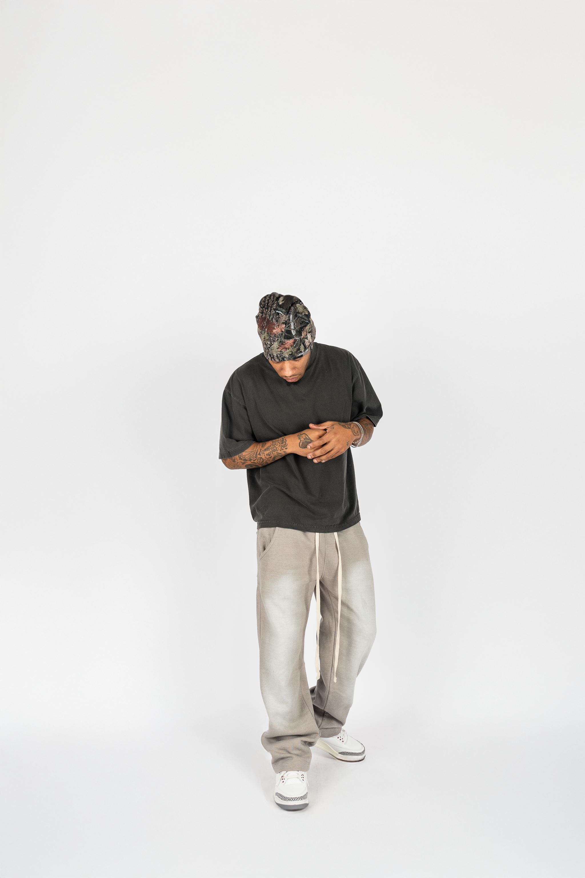 KTL Studios sun-dried bleached heavyweight cotton sweatpants with elastic waistband and outer drawstring, worn by male model