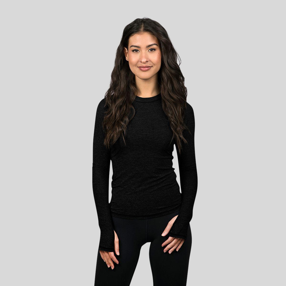 Women's long-sleeve UPF 50+ sun shirt in lightweight Italian fabric with thumbholes, shown from front