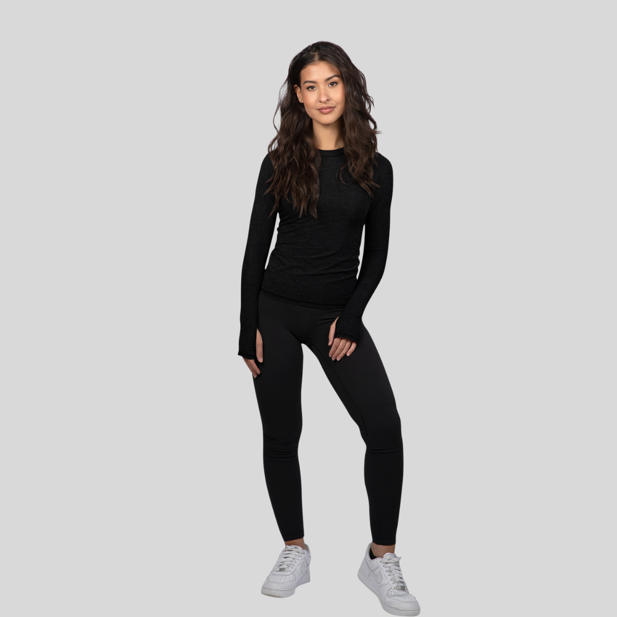 Women's long-sleeve UPF 50+ sun shirt in lightweight Italian fabric with thumbholes, shown from front