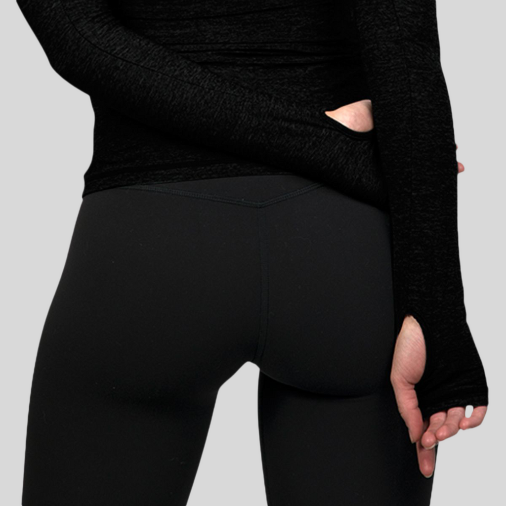 Women's long-sleeve UPF 50+ sun shirt in lightweight Italian fabric with thumbholes, shown from front