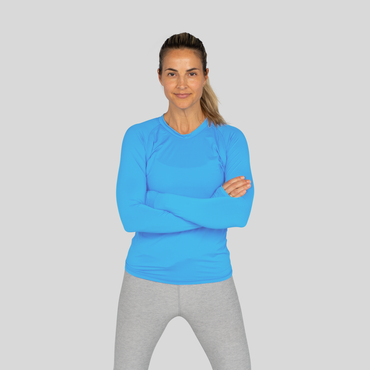 Women's long-sleeve UPF 50+ sun shirt in lightweight Italian fabric with thumbholes, shown from front