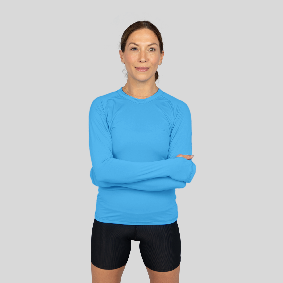 Women's long-sleeve UPF 50+ sun shirt in lightweight Italian fabric with thumbholes, shown from front