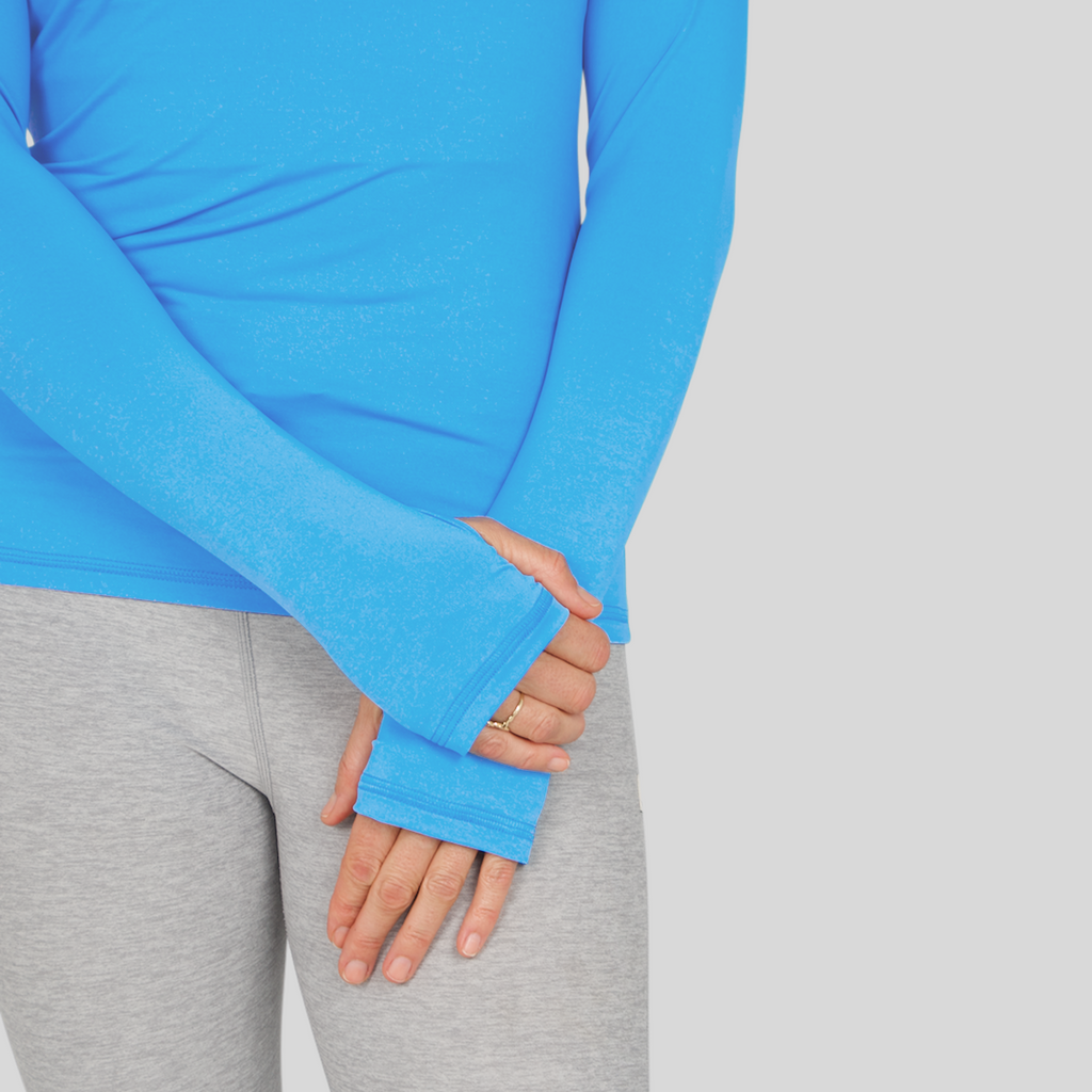 Women's long-sleeve UPF 50+ sun shirt in lightweight Italian fabric with thumbholes, shown from front