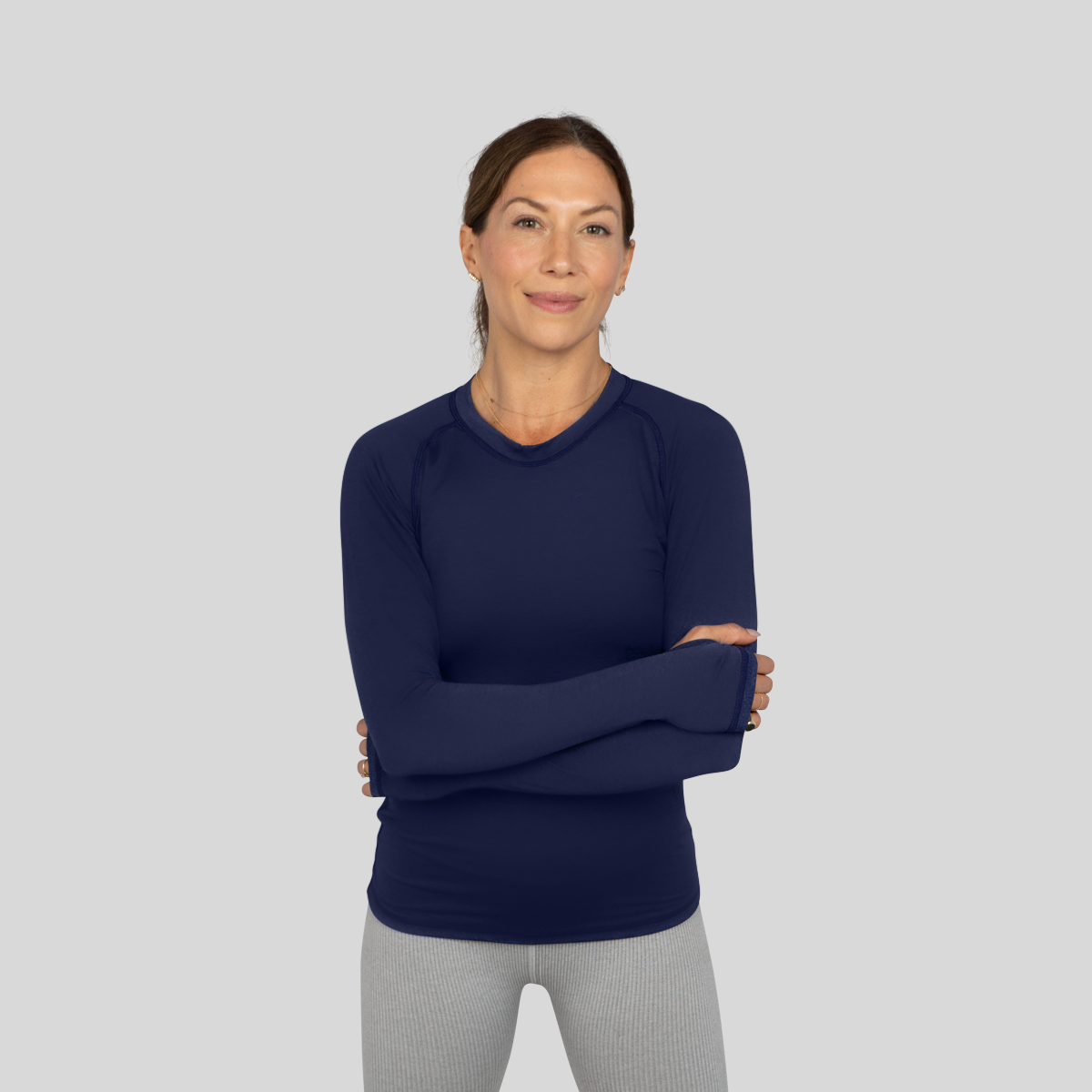 Women's long-sleeve UPF 50+ sun shirt in lightweight Italian fabric with thumbholes, shown from front