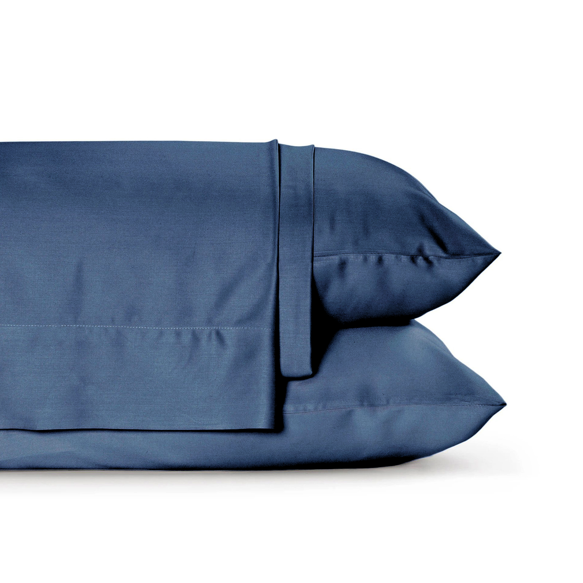 Four-piece bamboo viscose sheet set in neutral tone draped over a neatly made bed, showing silky smooth fabric texture