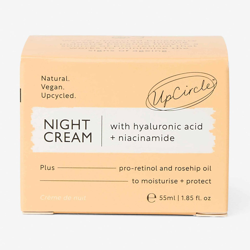UpCircle Night Cream in glass jar with aluminum lid, showing hyaluronic acid and niacinamide overnight moisturizer