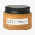 UpCircle Night Cream in glass jar with aluminum lid, showing hyaluronic acid and niacinamide overnight moisturizer