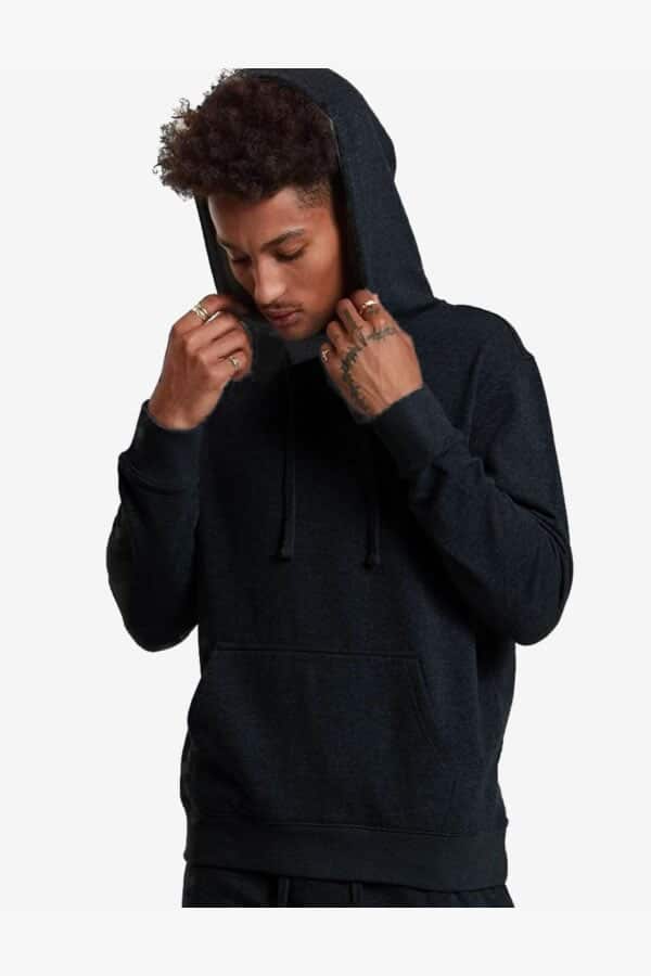 Heavyweight cotton fleece pullover hoodie in a structured standard fit, shown in a neutral colorway with ribbed cuffs and waistband