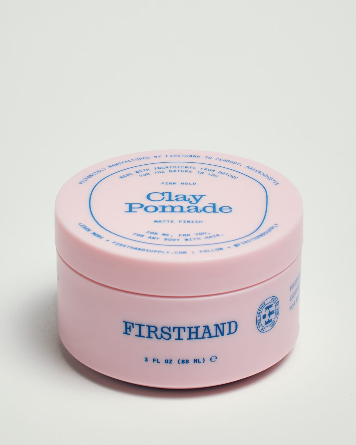 Firsthand Supply Clay Pomade 3 oz jar on a clean surface, matte finish lid with minimalist label