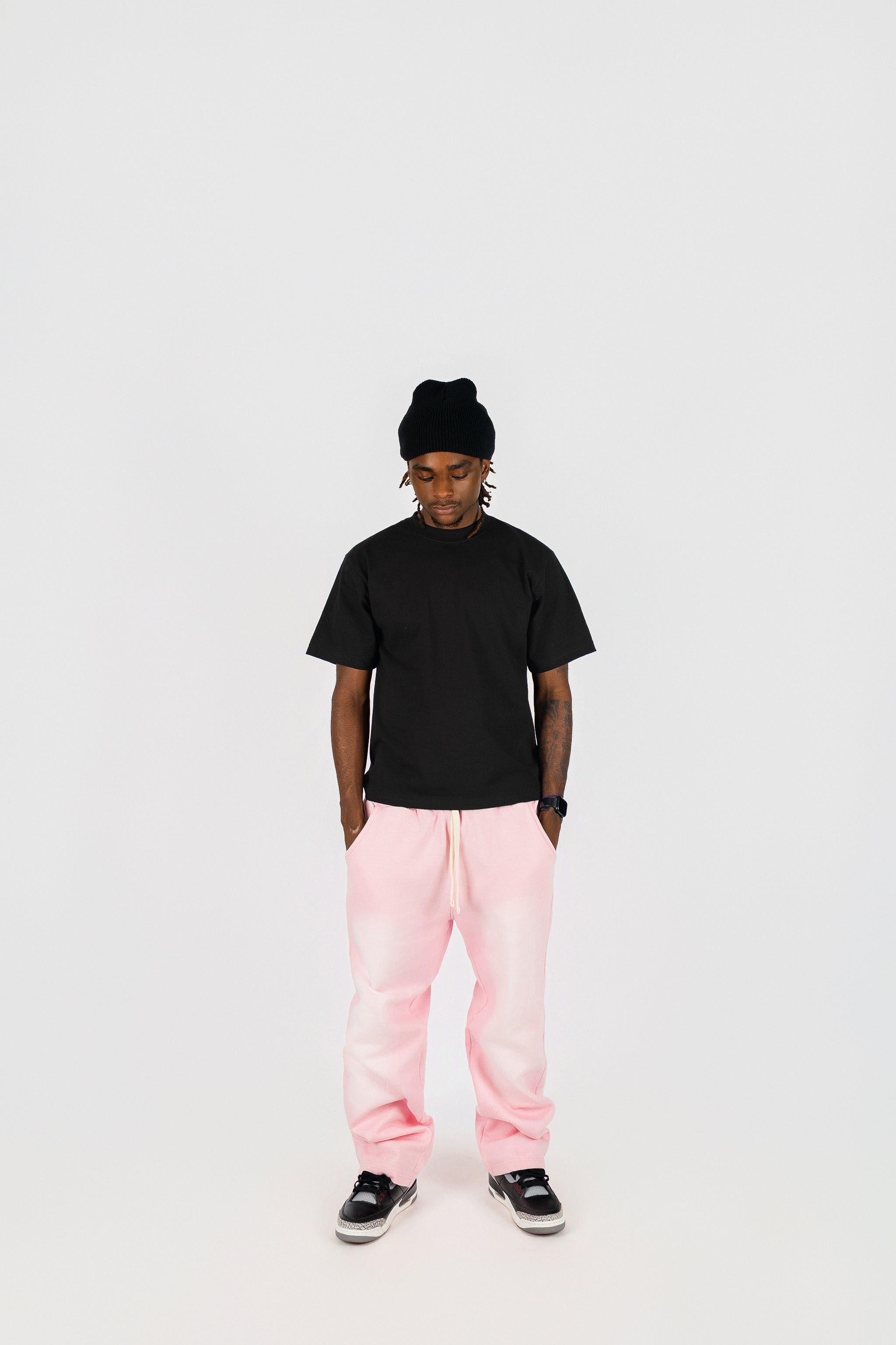 KTL Studios sun-dried bleached heavyweight cotton sweatpants with elastic waistband and outer drawstring, worn by male model