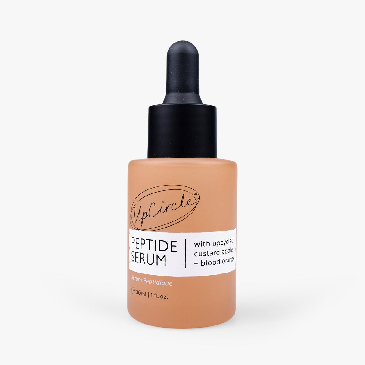 UpCircle Peptide Serum with Custard Apple and Blood Orange in a glass bottle, with a dropper and a skincare background