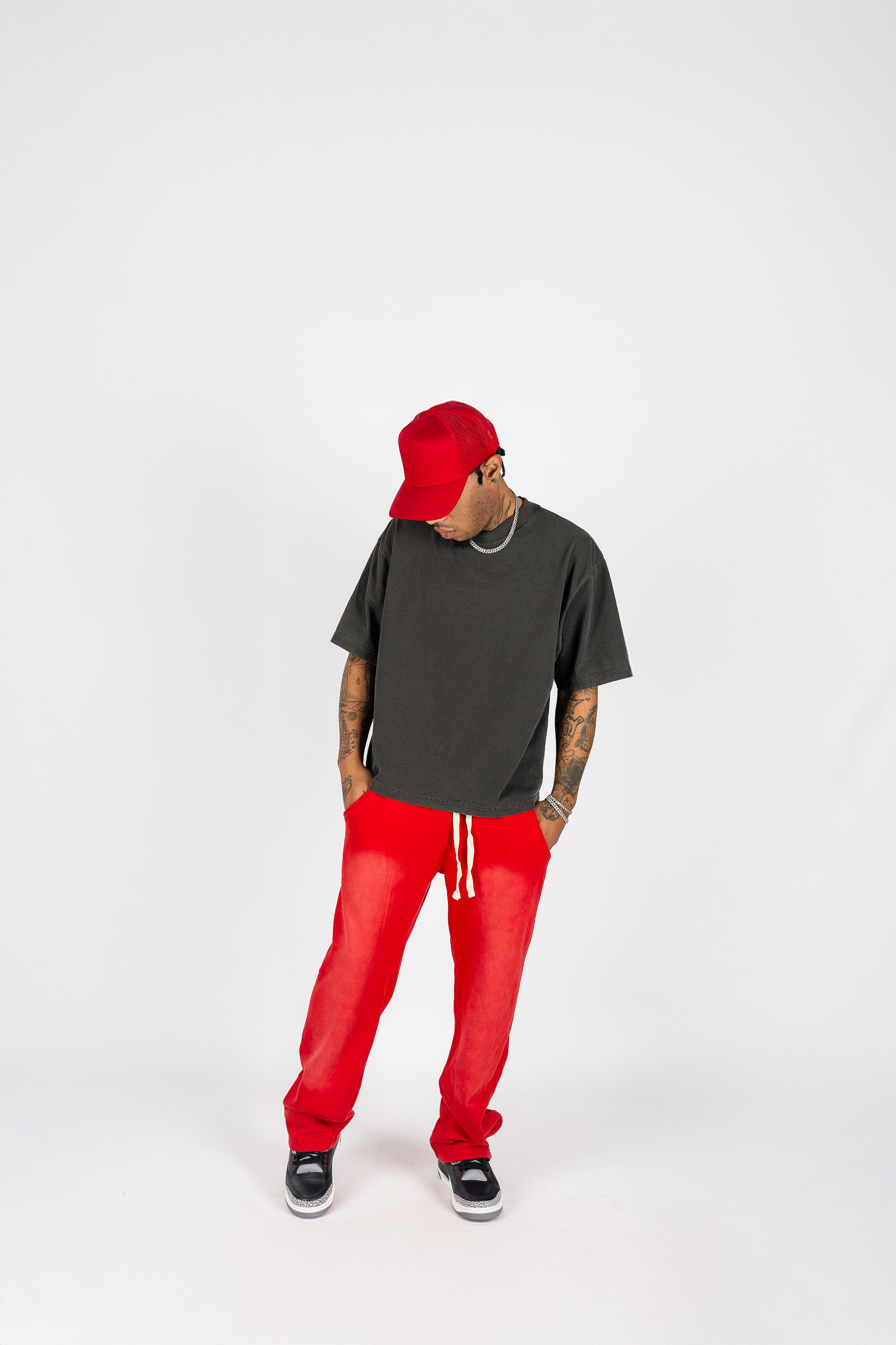 KTL Studios sun-dried bleached heavyweight cotton sweatpants with elastic waistband and outer drawstring, worn by male model