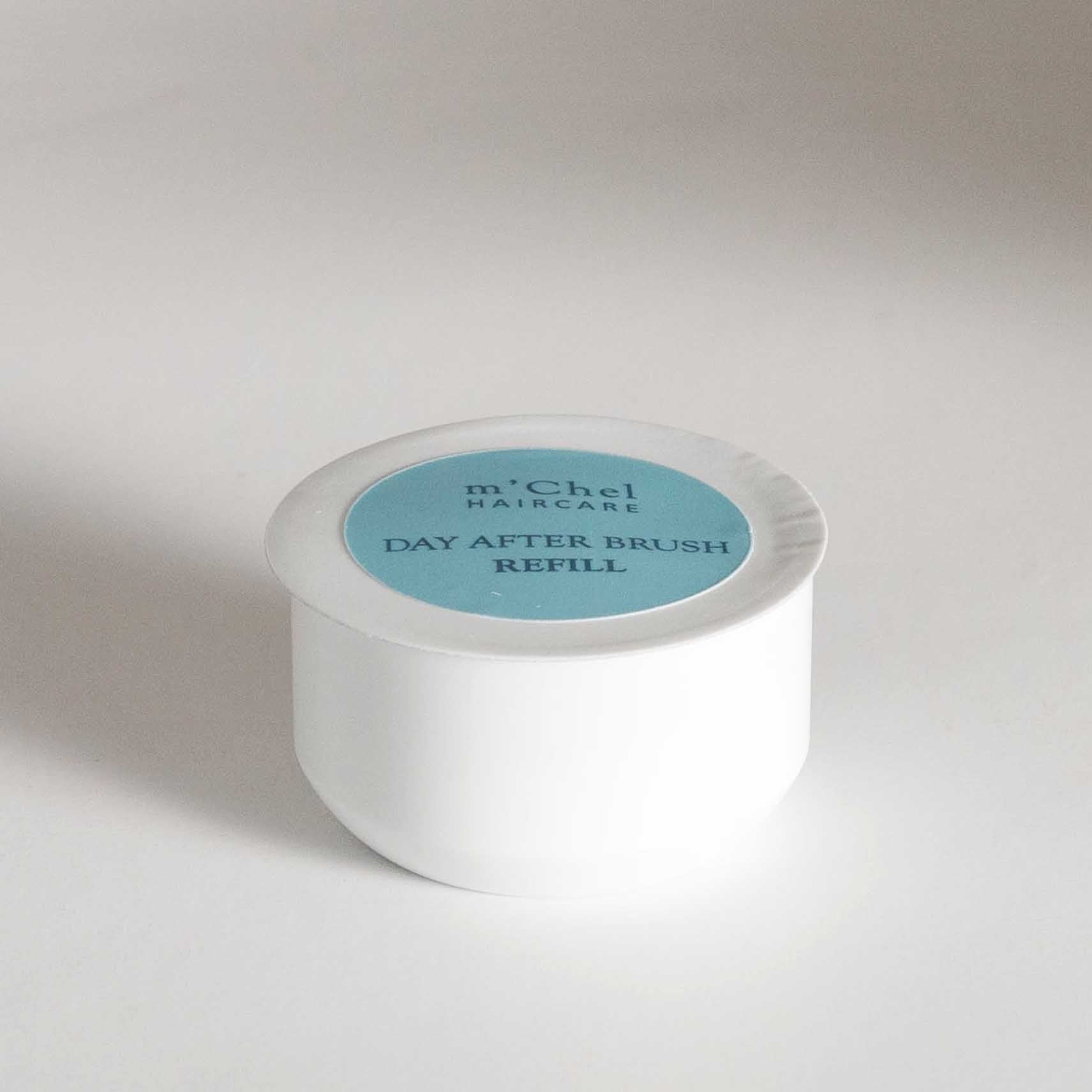 Day After dry shampoo brush refill powder canister in neutral packaging against a clean white background