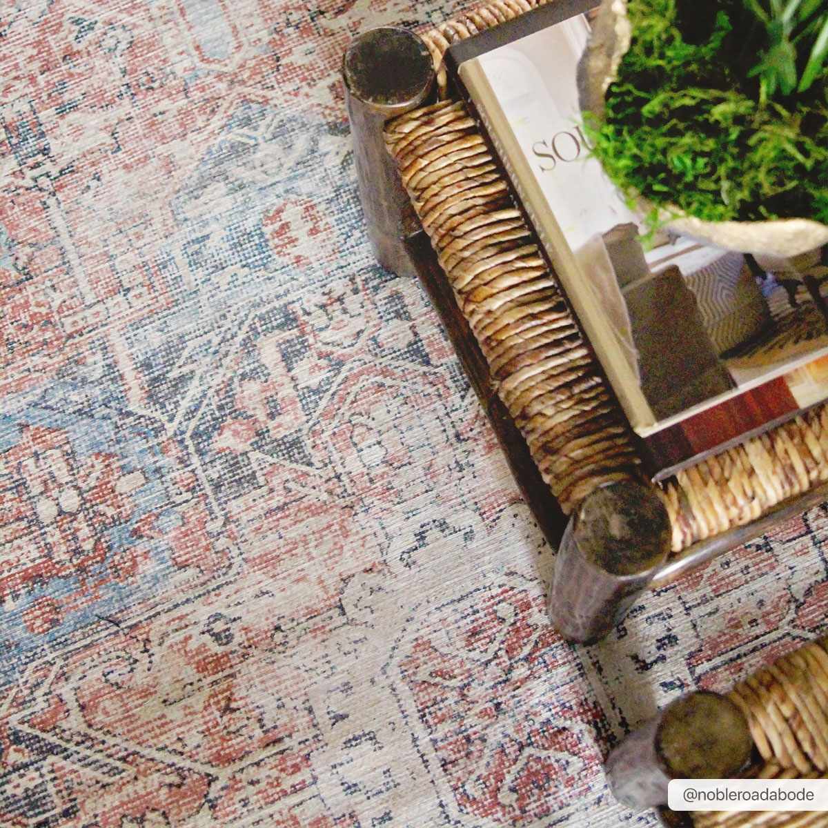 Rosman distressed flat weave area rug in warm red, blue, and earthy tones with vintage-inspired pattern