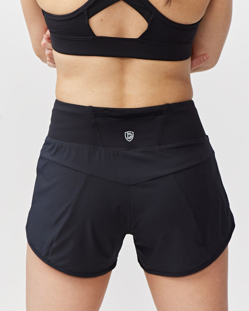Women's high-rise Sheva running shorts in a body-skimming fit with pleated detail and zip side pocket